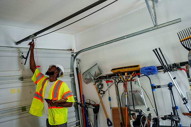 Professional Garage Door Panel Replacement technician working in Sylvan Lake, MI